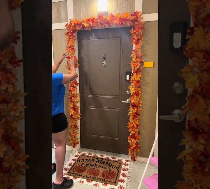 Cozy Fall Front Door Decor with Pumpkins, Wheat, and a Plaid Ribbon Wreath