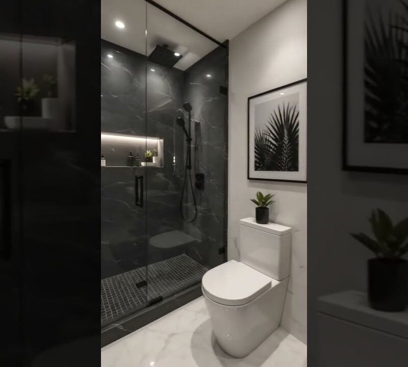 Moody Black Marble Bathroom With Gold Accents