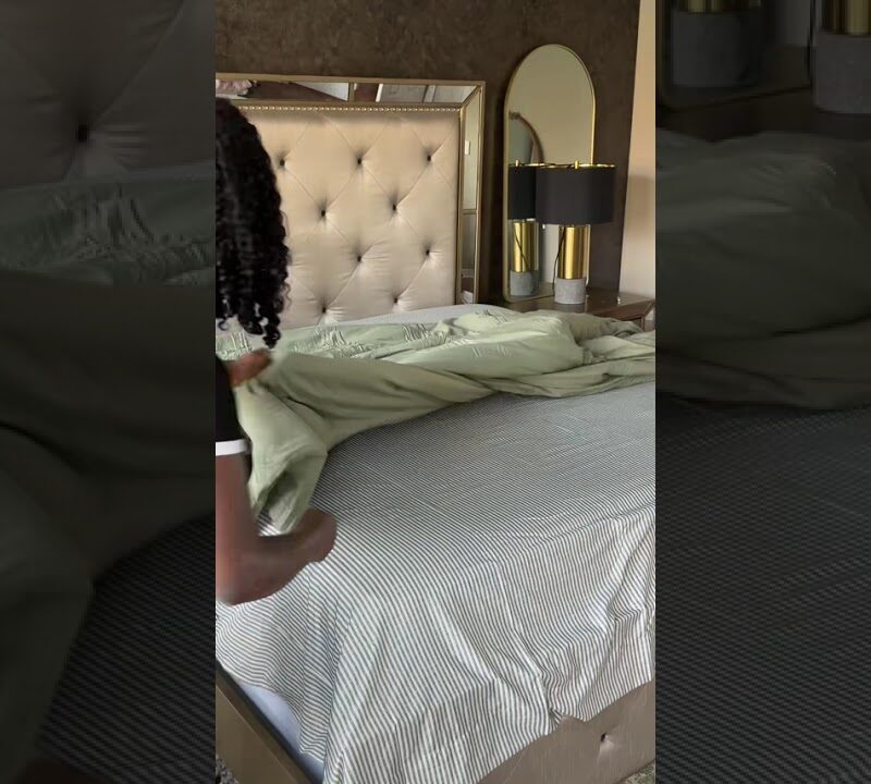 Cozy Neutral Bedroom With Layered Textures and Warm Lighting