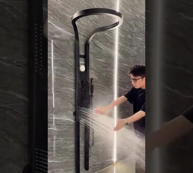 Spa-Inspired Luxury Bathroom with Marble, Warm Lighting & Gold Accents